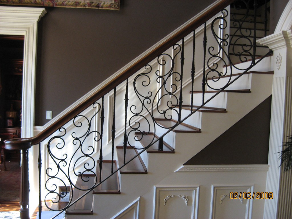 Modern black iron spindles and premium Stair Treads Toronto showroom selection