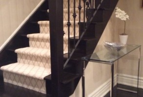 Elegant patterned carpet staircase runner installed by our professional Toronto gallery team