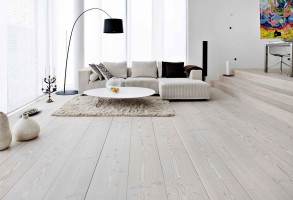 Spacious residential living room featuring bright laminate planks from our flooring gallery Toronto portfolio